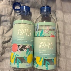 Sunny Life set of 2 plastic water bottles with floral design. NWT